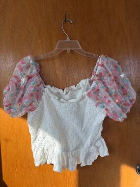 White Smocked Peplum Top with Pink Confetti Puff Sleeves